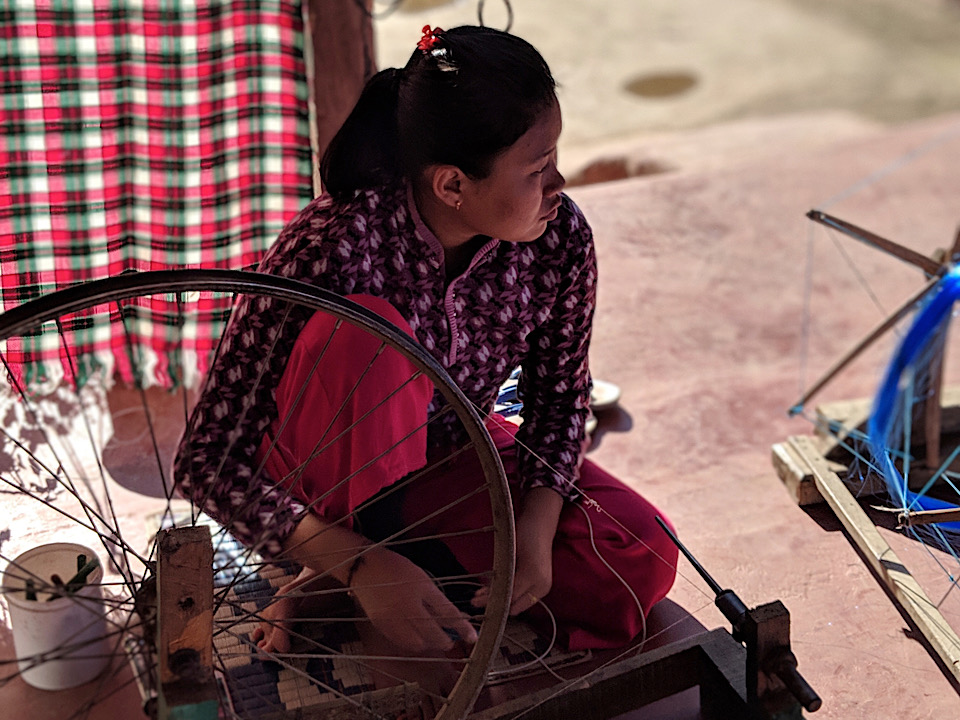 Maithi girl weaving in Loktak 