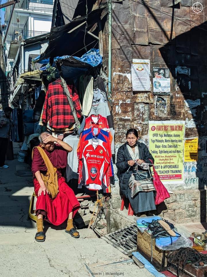 Old monk sitting with is sister McLeodganj
