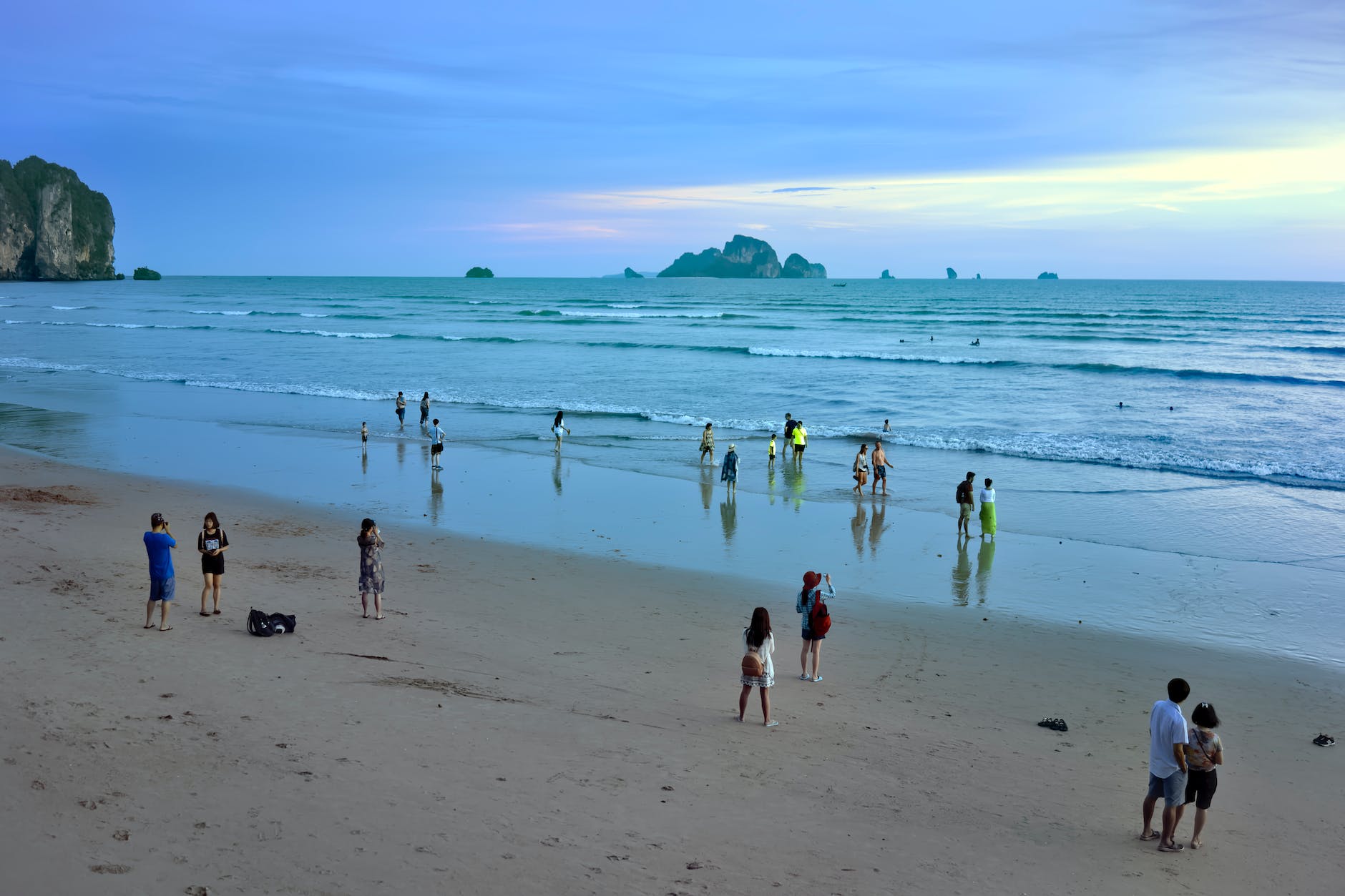 people in a beach in thailand