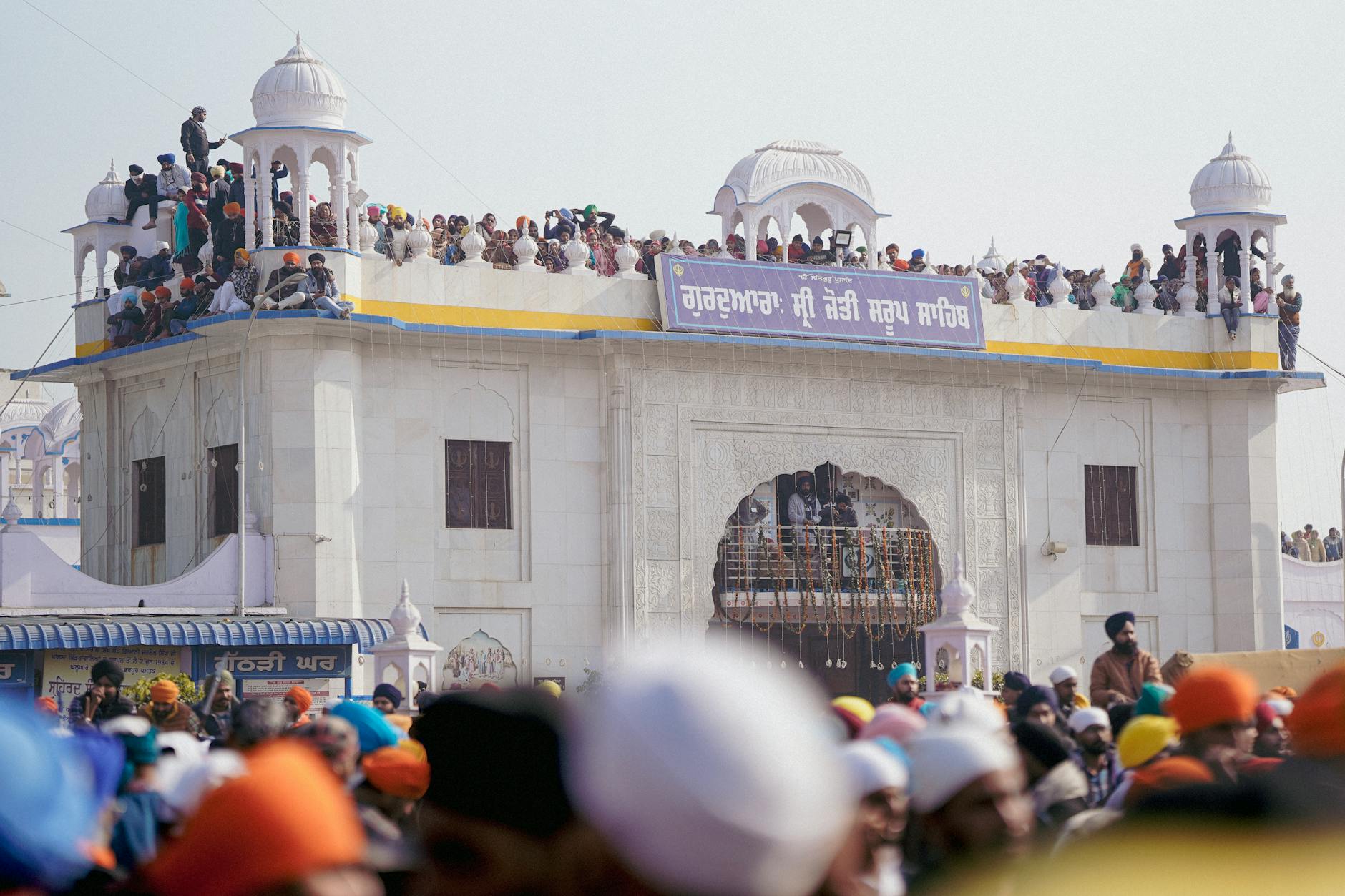 crowd during a celebration around the gurudwara sri jyoti saroop sahib punjab india
