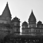 grayscale photo of the royal chhatris building in india