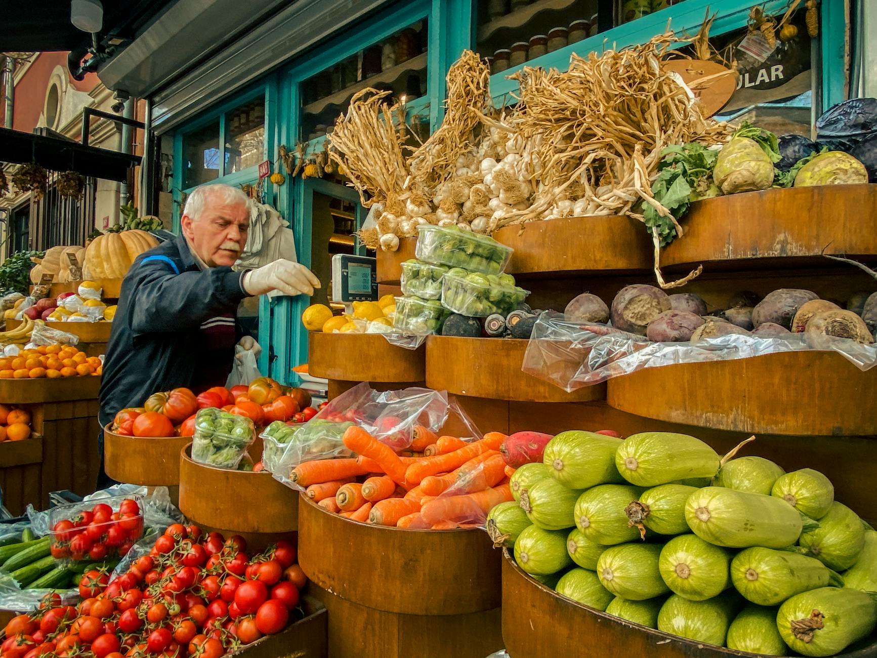 elderly man shopping at greengrocers